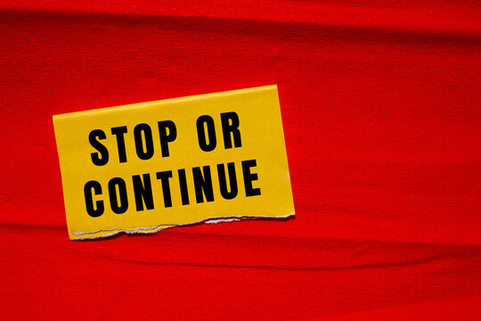 Stop or Continue text concept photo