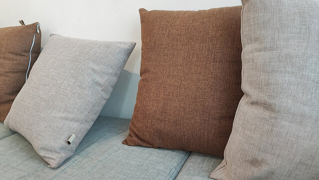 Cushions Arranged On Fabric Sofa