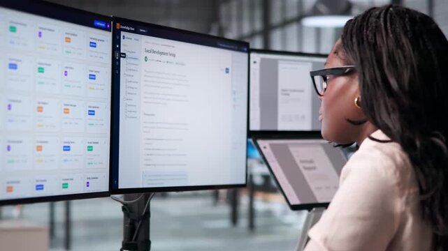 Female Office Manager Efficiently Organizes Digital Files