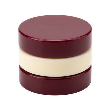 Stack of burgundy and cream round plastic tokens