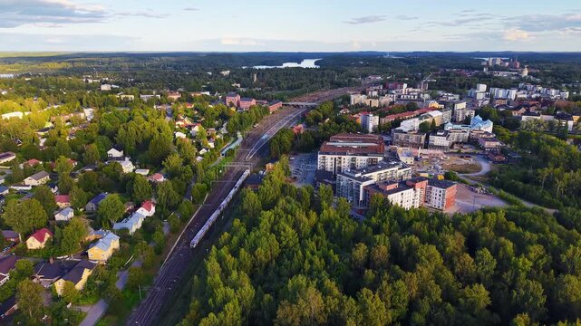 Aerial view of train arriving at the station of H&auml;meenlinna Finland