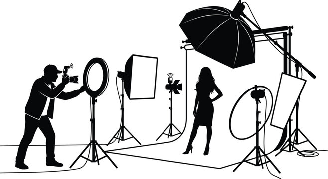 Photo studio silhouette with professional photographer taking pictures of a model using lighting equipment