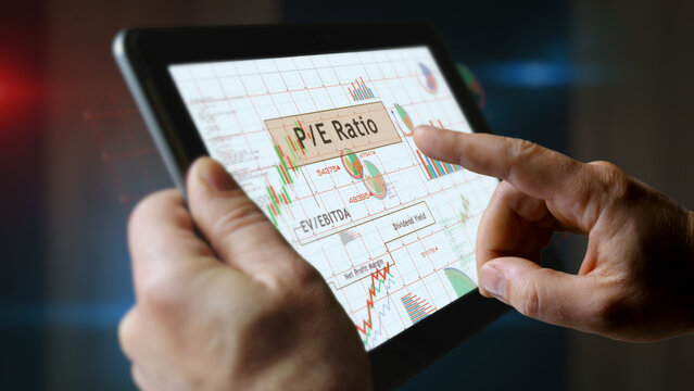 Stock market indices charts graphs on touchscreen pad display