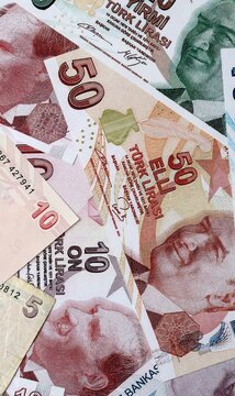 Turkish lira money bills in pile on table. Turkey TRY currency cash close up