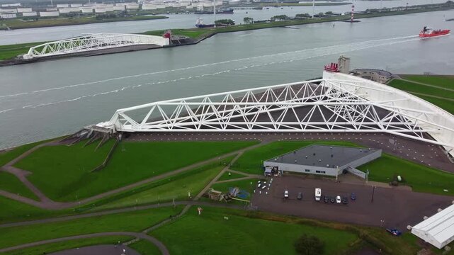 Maeslant Barrier (Maeslantkering), a movable storm surge barrier. Aerial view. Nieuwe Waterweg canal, entrance to the Port of Rotterdam, Netherlands.