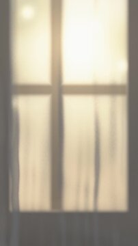 White sheer curtain gently moving in the breeze at a sunny window, soft morning light and leaf shadows, vertical seamless loop background with copy space