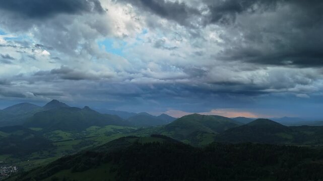 Aerial View of Incoming Storm Clouds Over Mountain Landscape