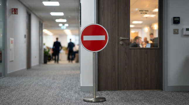 Red No Entry Sign in Office Hallway