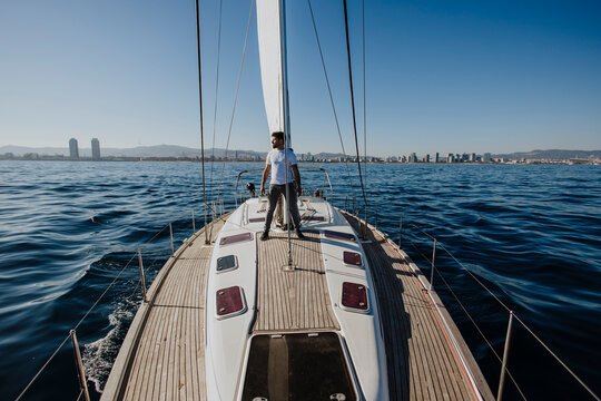 Man sails a yacht on the open Mediterranean sea
