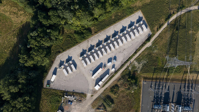 Aerial drone view shows battery storage facility for grid stability