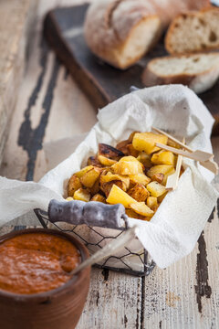 Tapas, patatas bravas and mojo sauce, bread