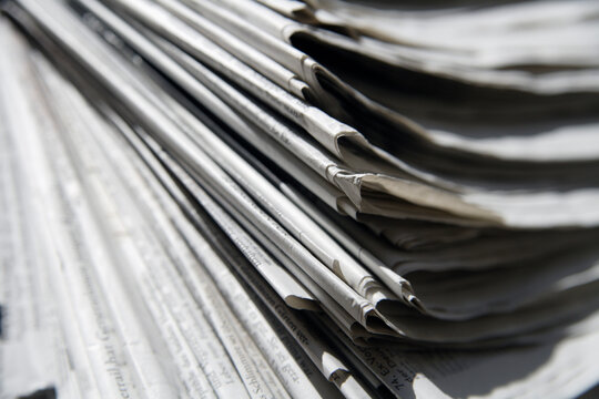 Germany, Stack of newspapers, close up