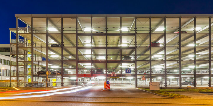 Germany, Stuttgart, lighted parking garage at night