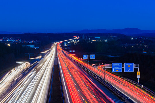 Germany, Baden-Wuerttemberg, Autobahn A8 near Wendlingen in the evening, light trails
