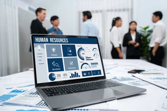 Human resources management software on computer screen helping human resources employee to manage recruitment, payroll, staff searching and KPI evaluation brisk