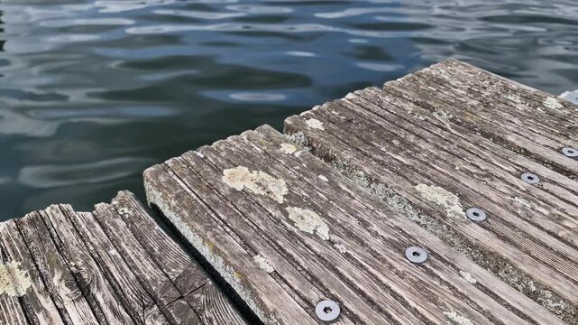 Weathered wooden dock boards beside Ziegelau&szlig;ensee lake