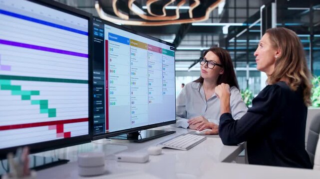 Woman Reviews Kanban Board To Organize Team Tasks