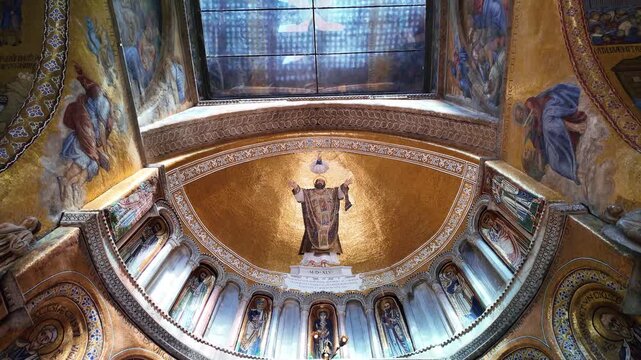 Interior of St. Mark's Basilica in Venice, Italy. One of the most important monuments on the lagoon, the church, rich in mosaics and ornate decorations, attracts millions of tourists annually.