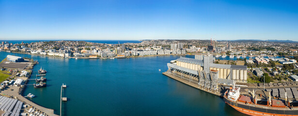 Fototapeta premium Aerial Newcastle Port docked ship city panorama