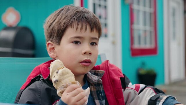 Asian Boy Holding Ice Cream Cone Outdoors