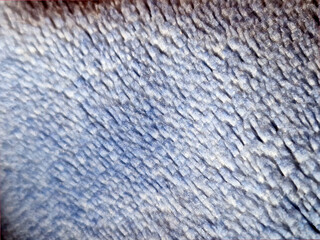 Abstract tie-dye fleece blanket texture with soft fluffy pile © Diana