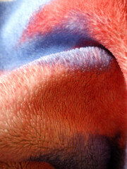 Abstract tie-dye fleece blanket texture with soft fluffy pile © Diana