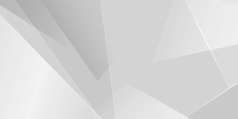 Obraz premium Abstract white and grey geometric background with sharp polygonal crystal shapes and soft white light lines