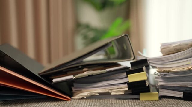 Stacks of Office Files, Folders and Business Paperwork