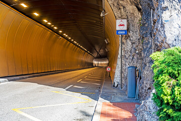 Naklejka premium Illuminated underground highway tunnel in Monaco for auto racing