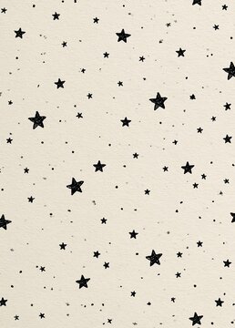 Seamless pattern of small black stars on a light beige background. the stars are scattered randomly across the image, creating a random and random pattern.