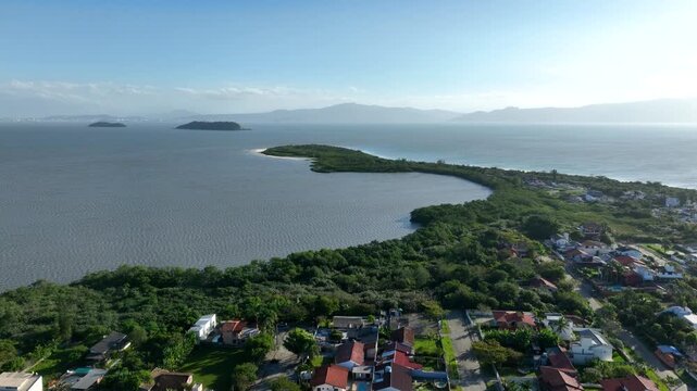 Florian&oacute;polis, Daniela Beach. Aerial View of Tropical Coastline. Establishing Shot. Santa Catarina, Brazil.
