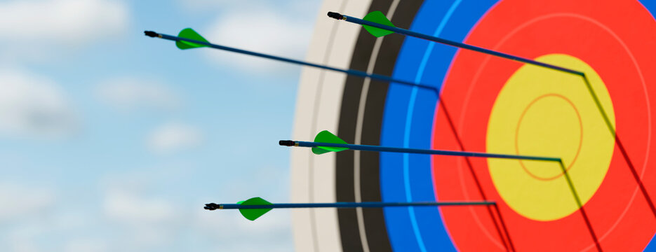 Archery target with multiple arrows hitting the bullseye representing business success