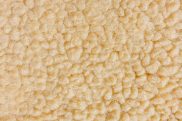 Cream sherpa fleece fabric texture seamless background © Iryna Miadzvedzeva