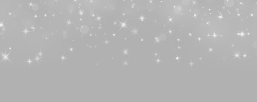 Scattered white sparkling starbursts and glowing orbs on black background with bokeh light effects on transparent background