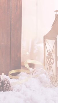 Animation of candles over window with christmas decorations