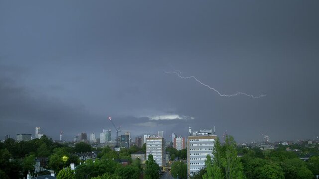 Birmingham City Skyline During Lightning Storm with Multiple Real Lightning Strikes.
Dramatic footage of Birmingham, England, skyline during a powerful thunderstorm.