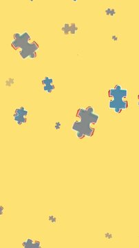 Digital animation shows puzzle pieces falling on yellow with a central black icon.