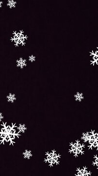 Digital animation of multiple snowflakes icons falling against black background