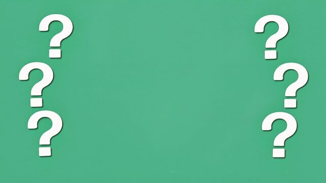 Animated white question marks on green background with copy space