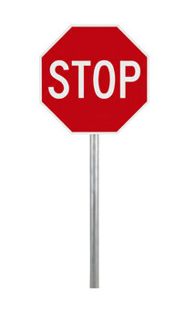 Red octagonal stop sign with white lettering on a metal pole