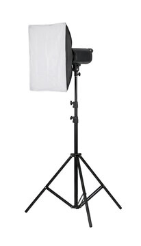 Professional studio softbox light on a tripod stand isolated on white background
