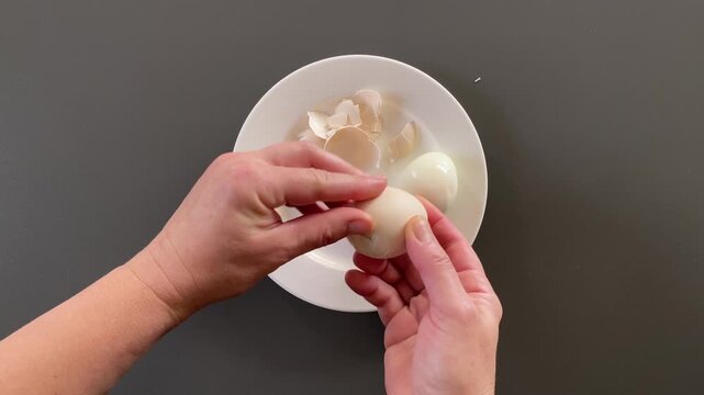 Cracking Fresh Eggs for Cooking Preparation