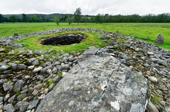 Corrimony Bronze Age chambered cairn showing massive cup-marked slab probably the capstone. Glen Urquhart, Highland, Scotland