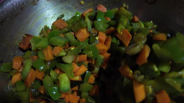 Healthy Vegetable Stir Fry Preparation , carrot cut and capsicum cuts