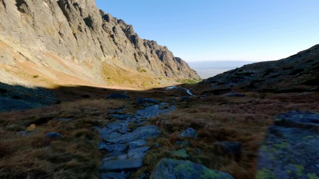 Action POV Hyperlapse Hiking Along Rocky Alpine Mountain Trail