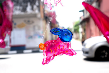 Lanterns hanging on a stand in the streets of Malaysia during Mid Autumn Festival of  the Lunar Calendar © Denise