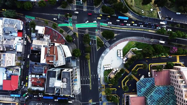 Aerial View of Quito Ecuador Modern City Center with Curved Roads, Traffic, High Rise Buildings and Urban Infrastructure Design