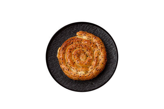 Greek cheese and sesame pie, a traditional Balkan dish. Balkan pie