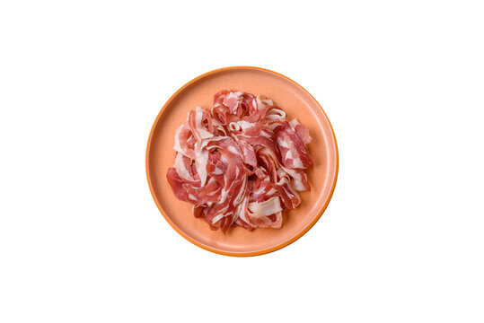 Slices of pork pancetta, ham, or bacon for a festive antipasto platter