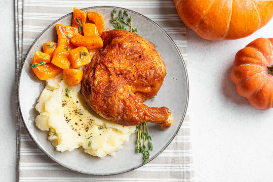 Autumn meal: roasted chicken with glazed pumpkin and mashed potato